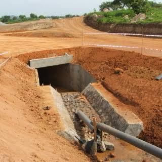Concrete culvert outlet with riprap channel